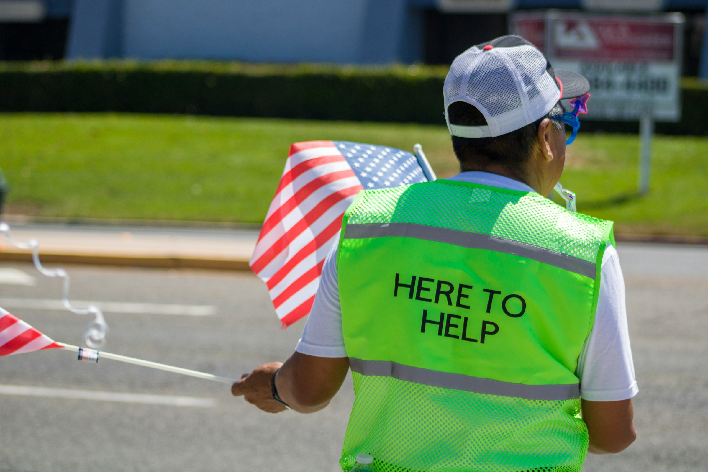 Crew member wearing a Here To Help safety vest